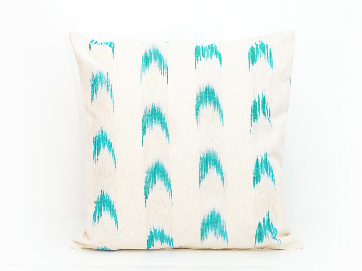 Cojín artesanal modelo 61 en verde con diseño de llengües de Teixits Vicens