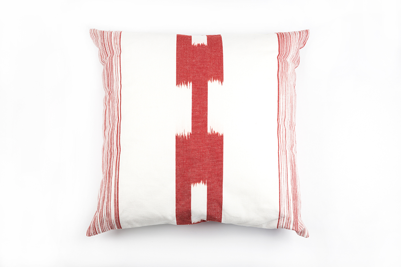 Cojín artesanal con diseño de cadena en color rojo de Teixits Vicens